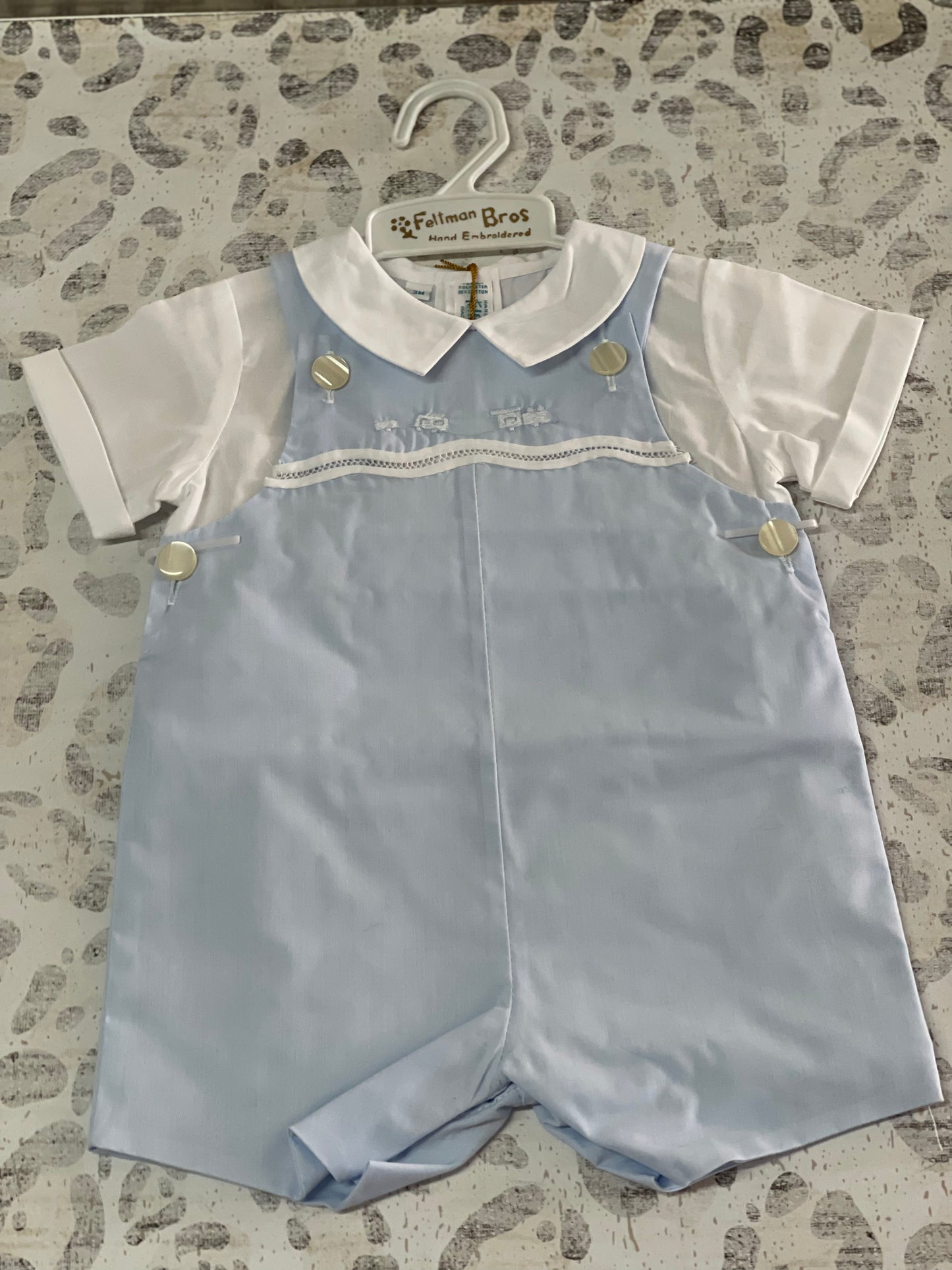 Feltman Brothers Blue romper with train